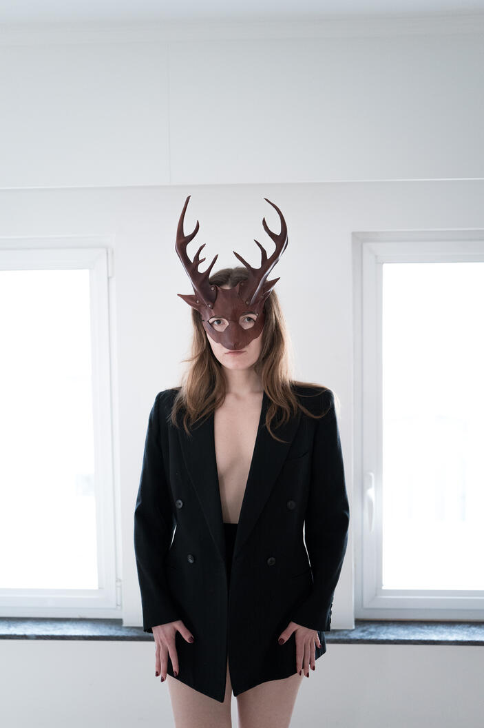 photograph, female figure, mask, interior, window light